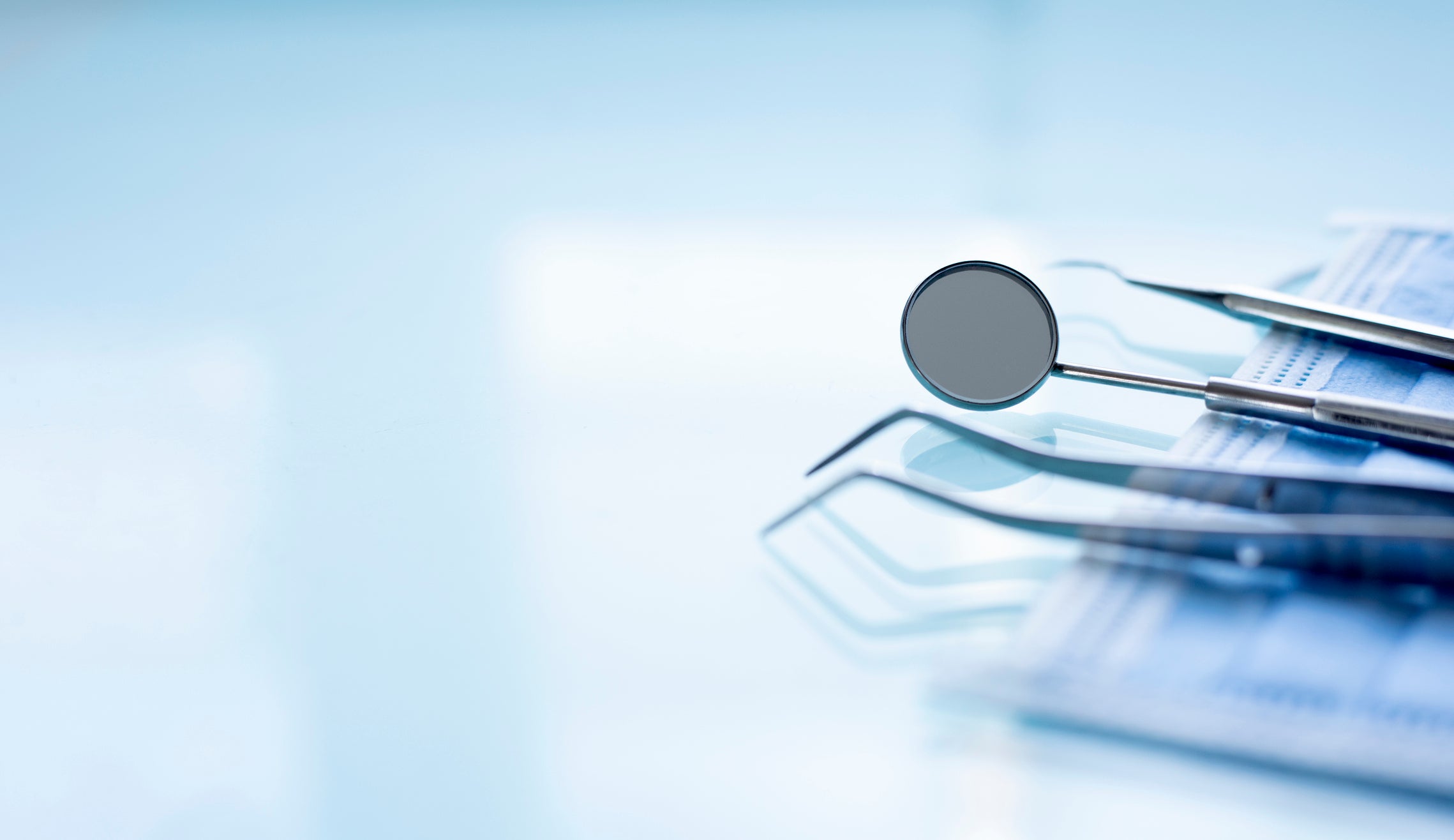 Dental tools on a blurred background. 